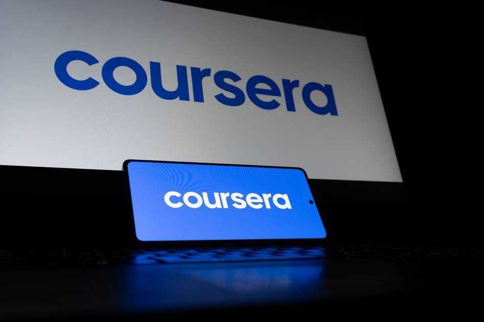 Blog author reviewing language learning apps on laptop